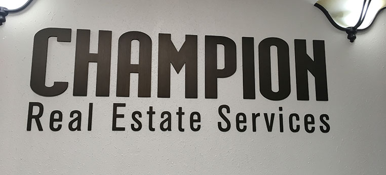 Signs - Champion Real Estate photo